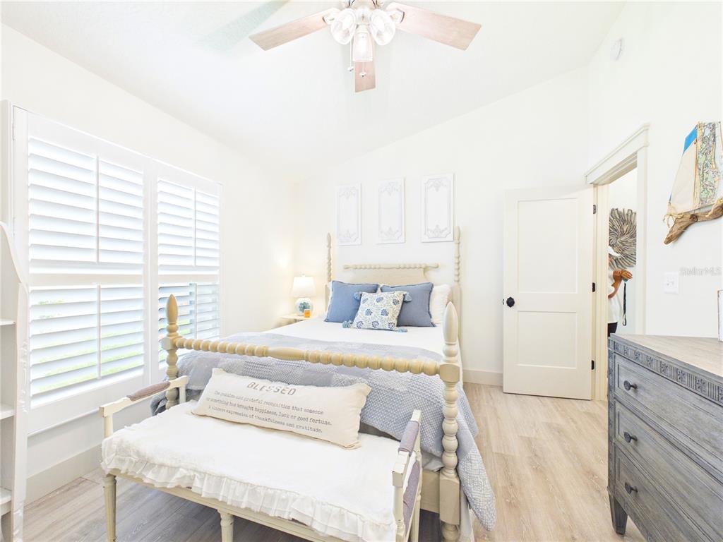 426 Long Cove Road Ormond Beach, FL 32174 - Photo 24 of 73 a bedroom with a bed and a dresser