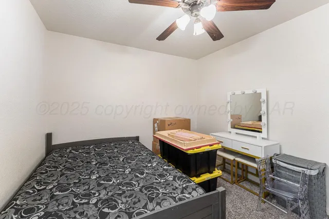 a living room with a couch and a stove