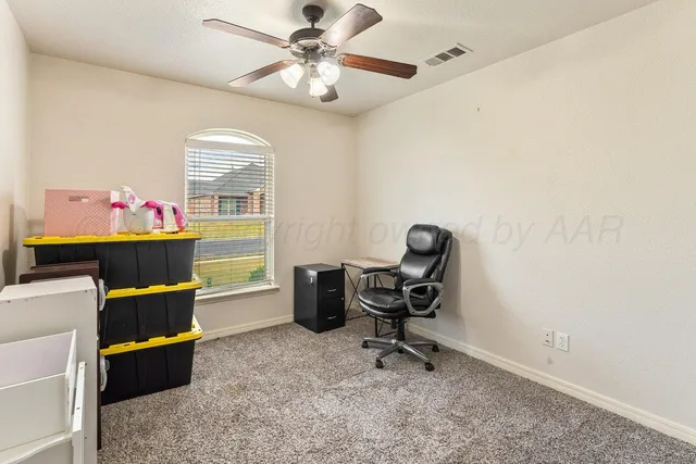 a view of a livingroom with furniture