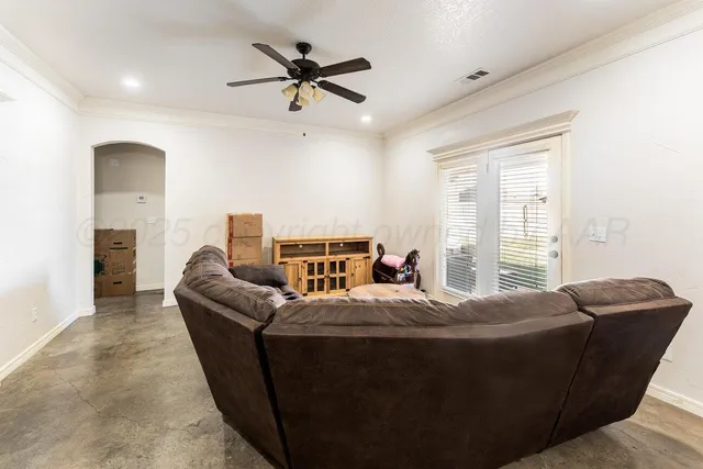 a room with a bed and furniture