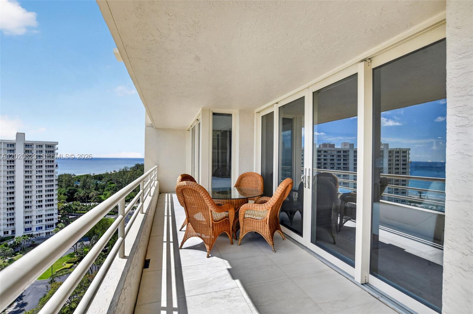 4101 North Ocean Boulevard, Unit 1605 Boca Raton, FL 33431 - Photo 27 of 35 a balcony with chairs and outdoor view