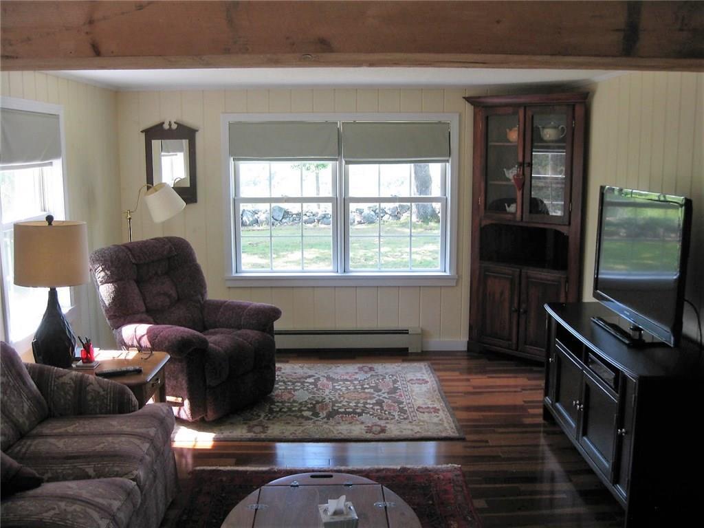 586 Mills Road Whitefield, ME 04353 - Photo 10 of 35 Living Room with Brazilian cherry wood