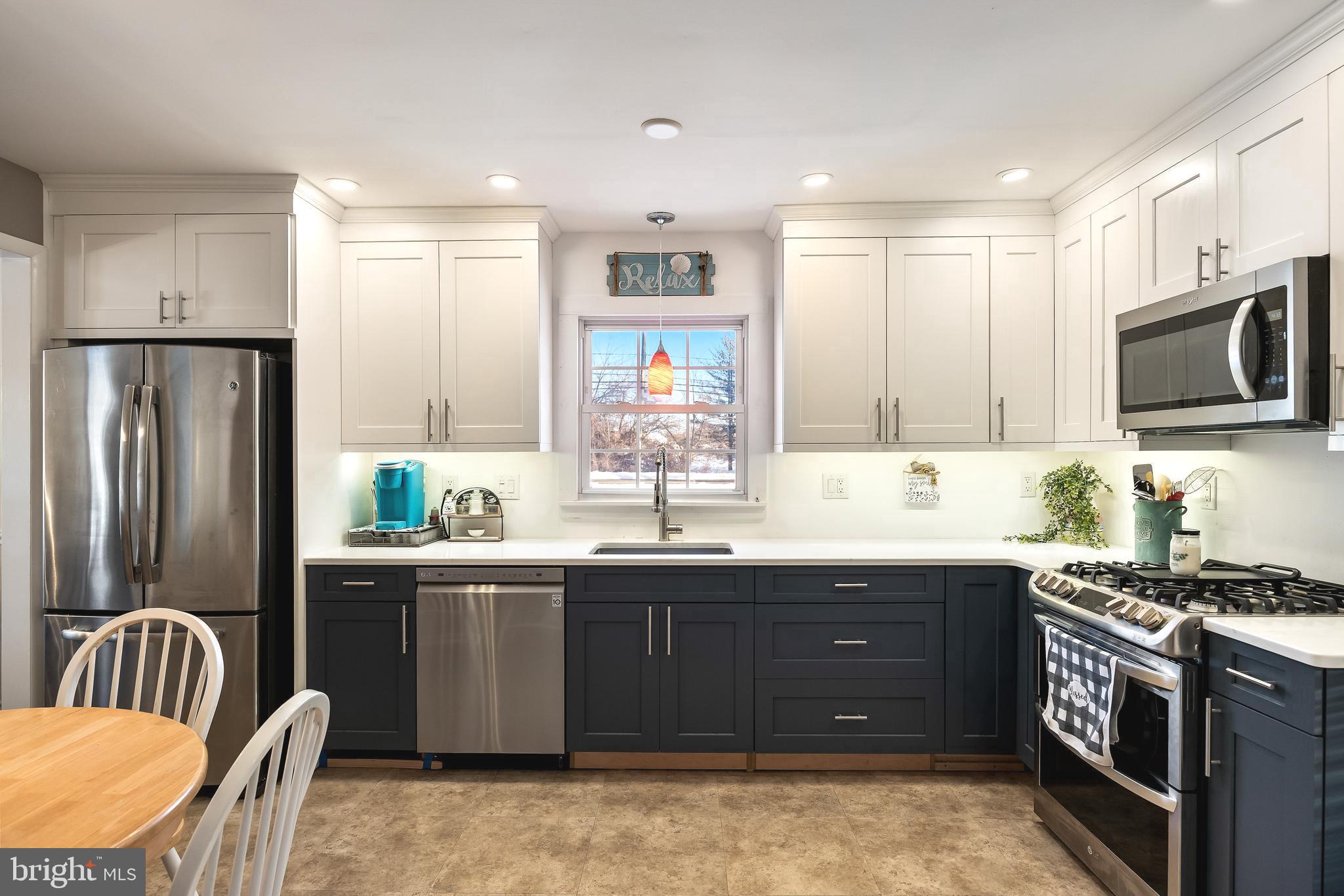 1 Echo Avenue Moorestown, NJ 08057 - Photo 12 of 30 a kitchen with stainless steel appliances granite countertop a sink a stove a refrigerator and a refrigerator