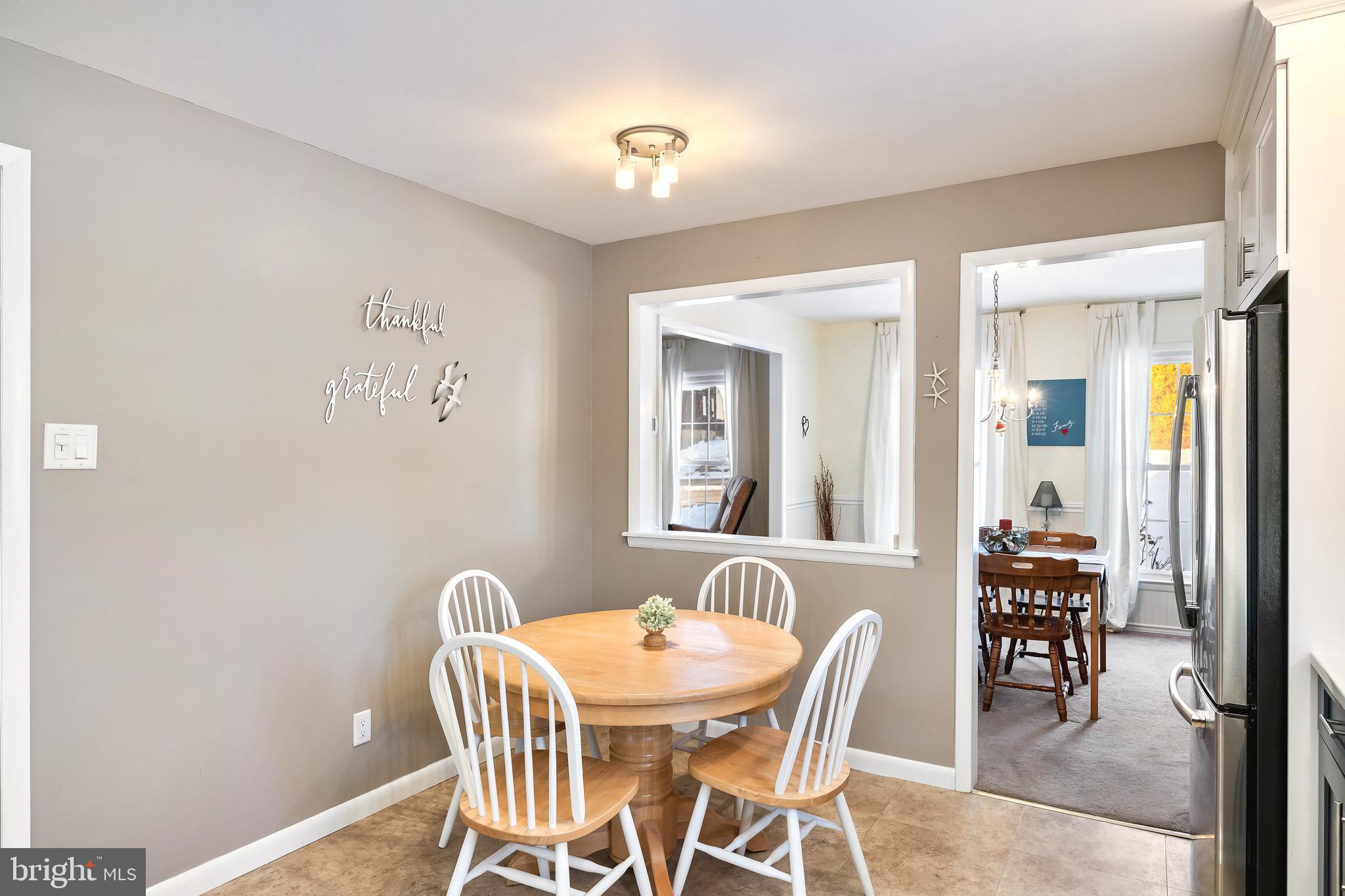 1 Echo Avenue Moorestown, NJ 08057 - Photo 14 of 30 a view of a dining room with furniture and wooden floor