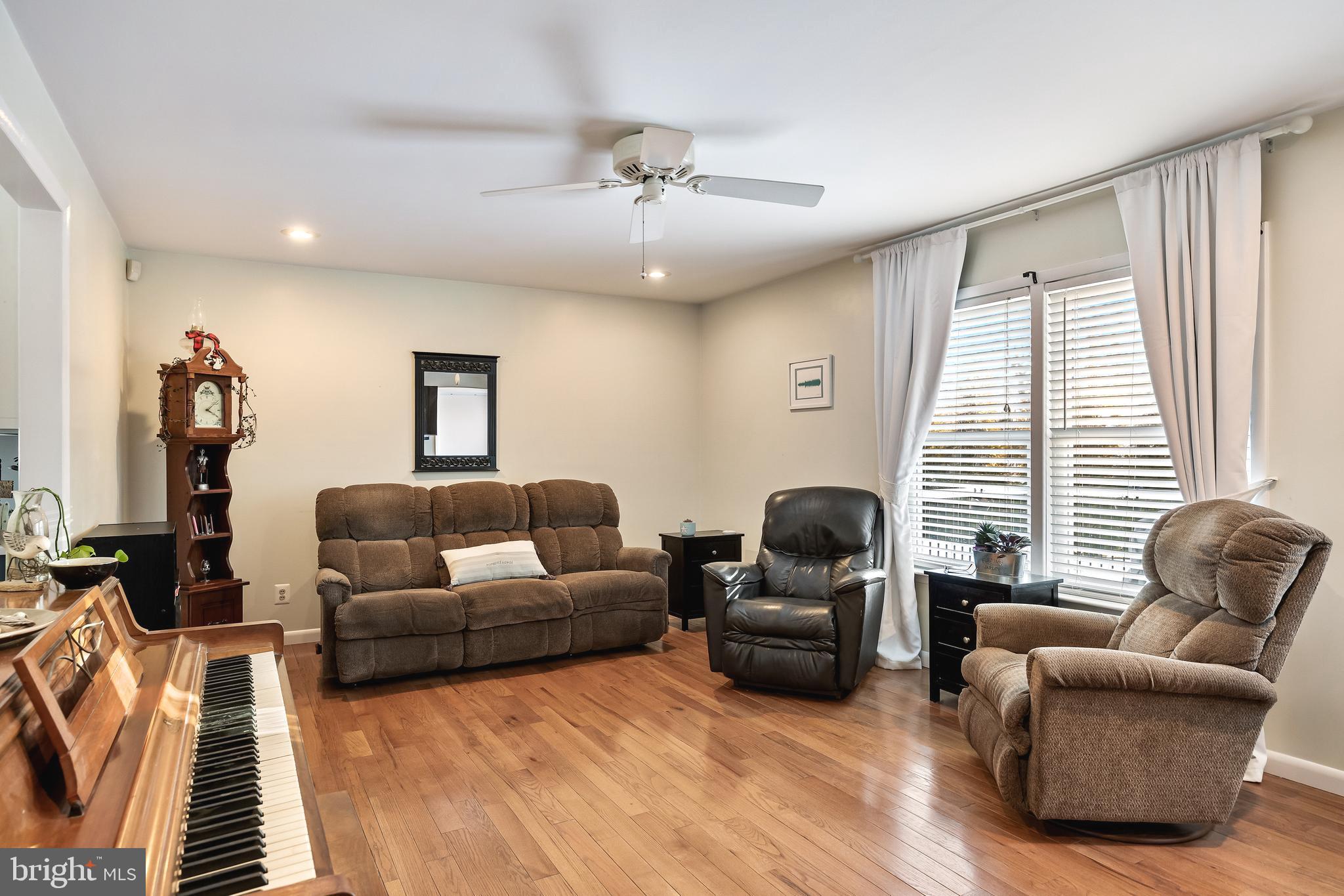 1 Echo Avenue Moorestown, NJ 08057 - Photo 16 of 30 a living room with furniture and a flat screen tv