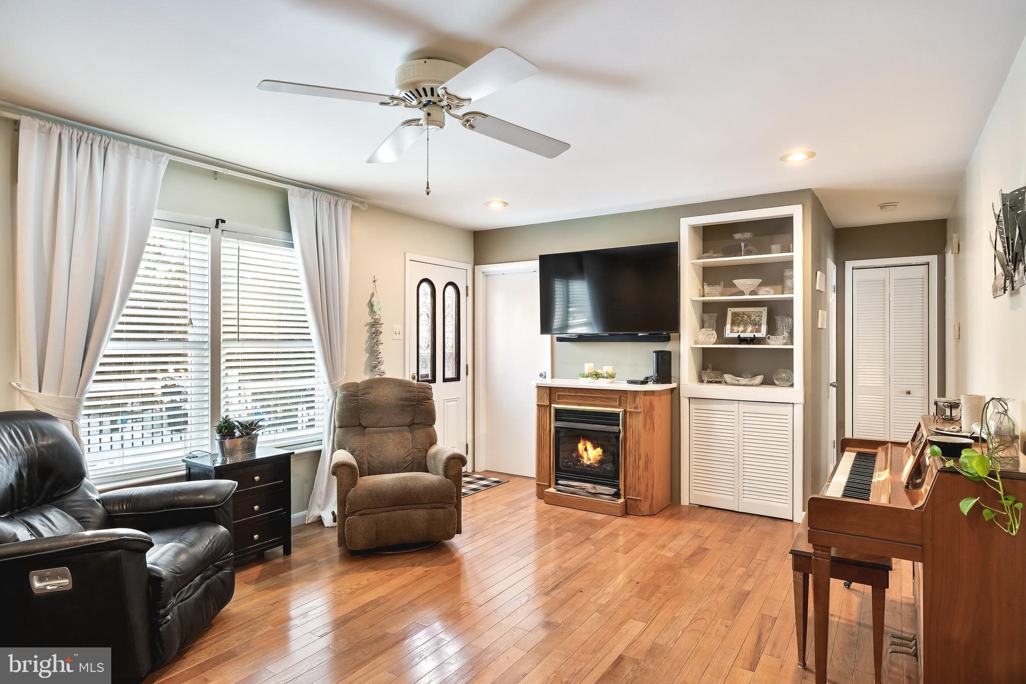 1 Echo Avenue Moorestown, NJ 08057 - Photo 17 of 30 a living room with furniture flat screen tv and fireplace