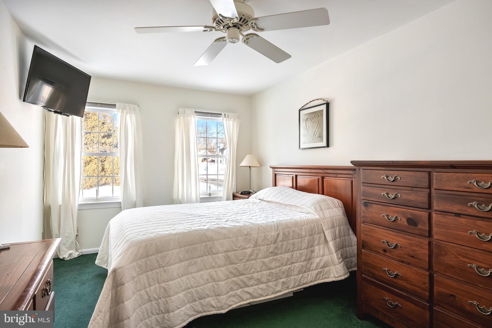 1 Echo Avenue Moorestown, NJ 08057 - Photo 20 of 30 a bedroom with a bed and a flat screen tv