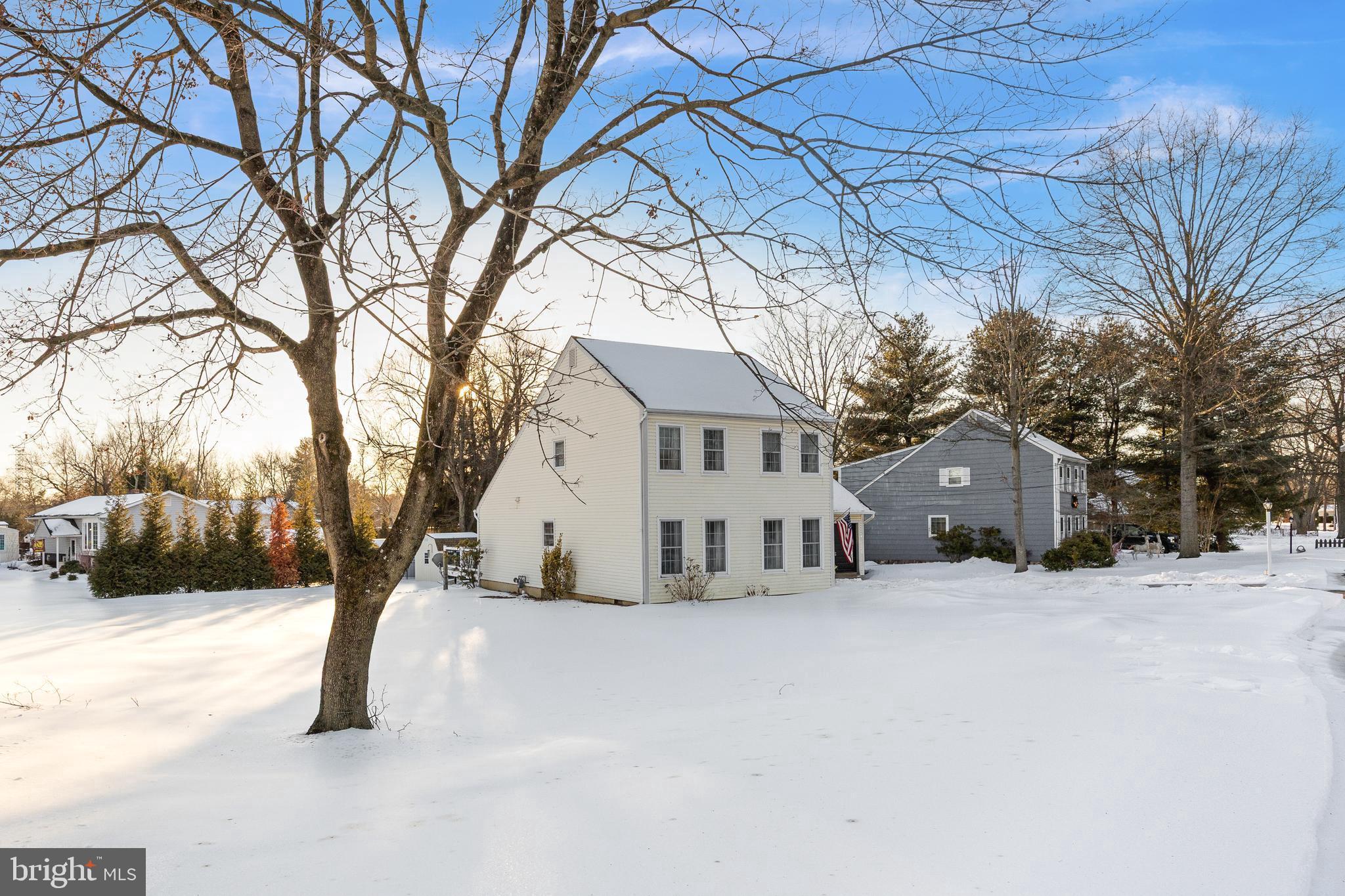 1 Echo Avenue Moorestown, NJ 08057 - Photo 3 of 30 a view of white house with a snow in front of yard