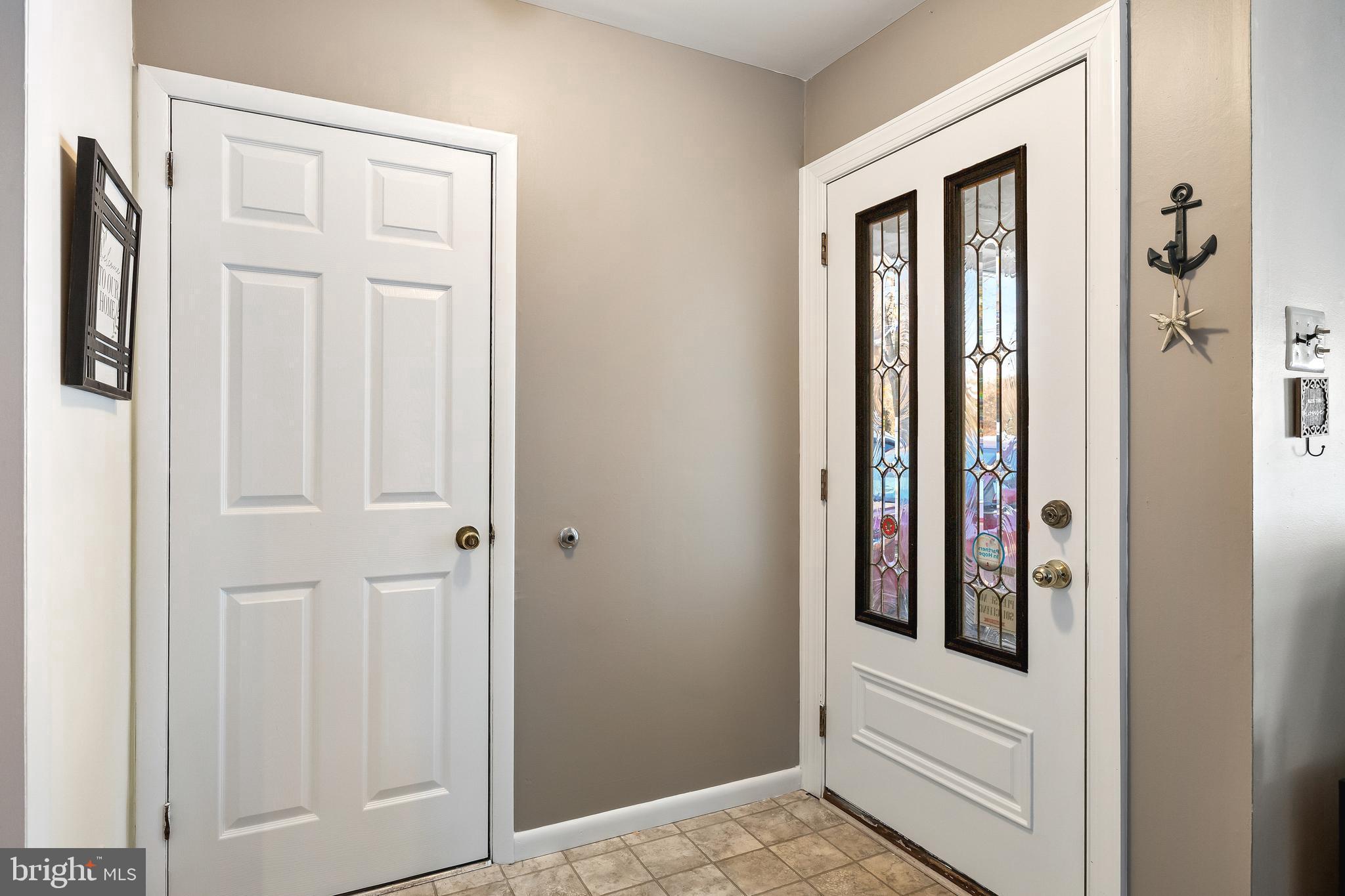 1 Echo Avenue Moorestown, NJ 08057 - Photo 6 of 30 a view of a hallway with wooden floor and closet