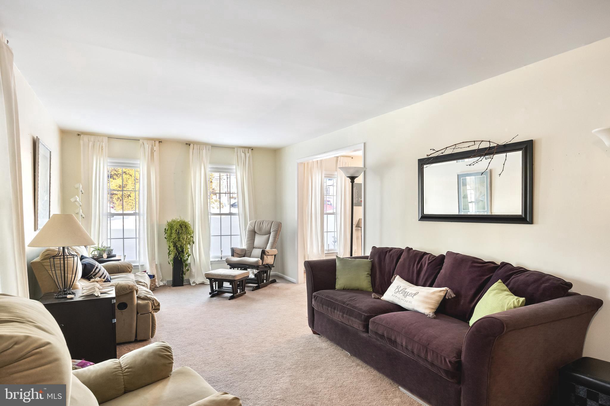 1 Echo Avenue Moorestown, NJ 08057 - Photo 7 of 30 a living room with furniture and a large window