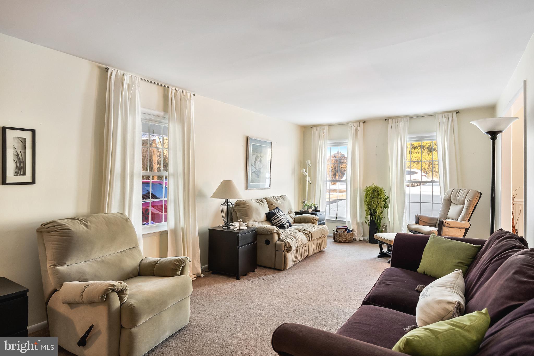 1 Echo Avenue Moorestown, NJ 08057 - Photo 8 of 30 a living room with furniture and a large window
