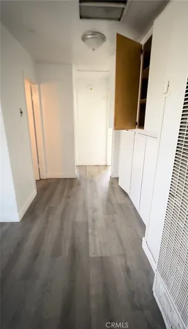 a large kitchen with kitchen island a sink dishwasher and a stove top oven