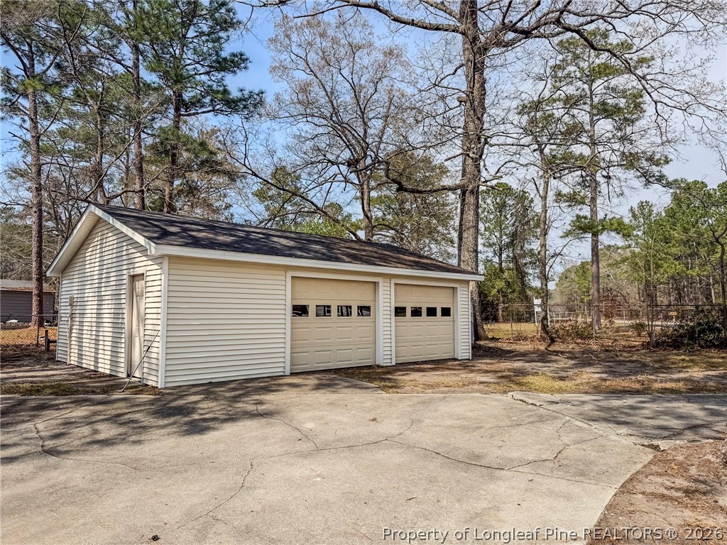 575 Veterans Road St. Pauls, NC 28384 - Photo 2 of 27 front view of a house with a large tree