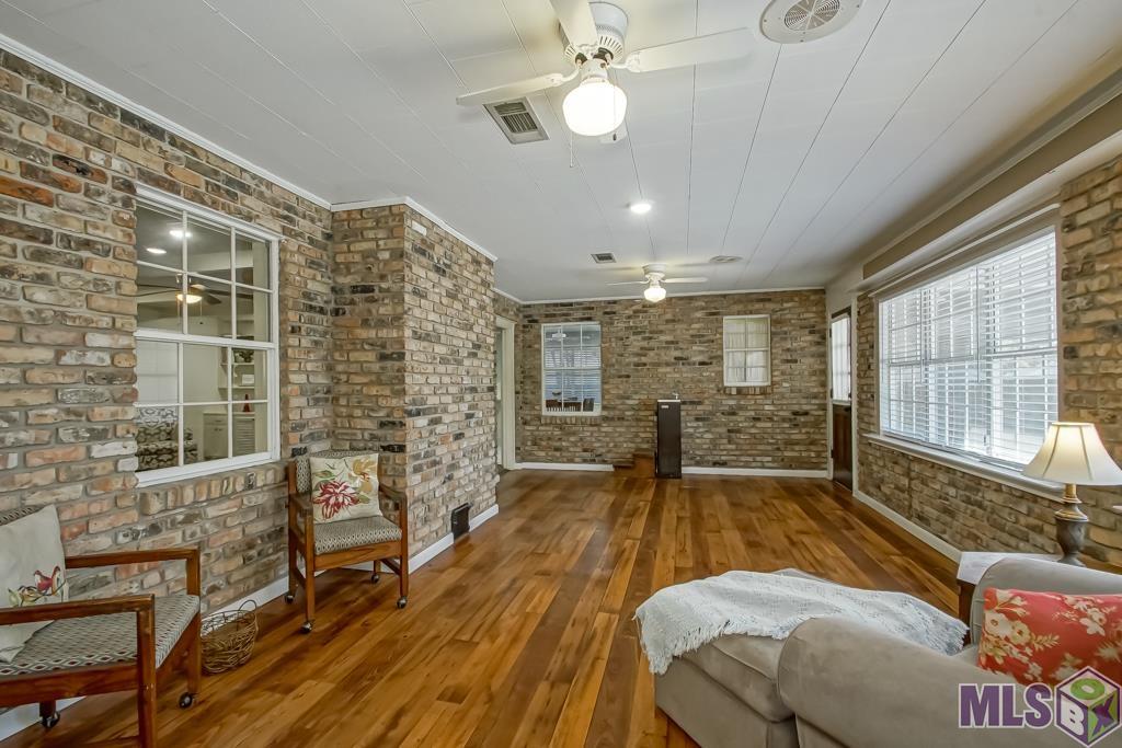 9132 Tallyho Avenue Baton Rouge, LA 70806 - Photo 7 of 41 Sunroom with a water fountain for convenience