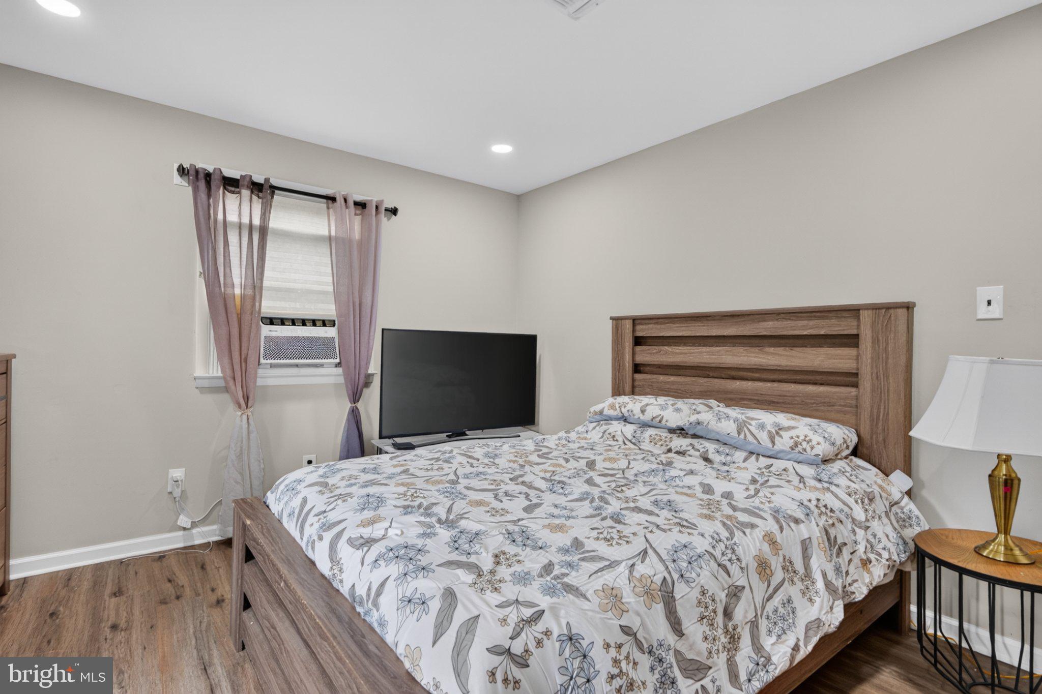 227 Ruth Avenue Maple Shade, NJ 08052 - Photo 9 of 22 Cozy bedroom with modern touches.