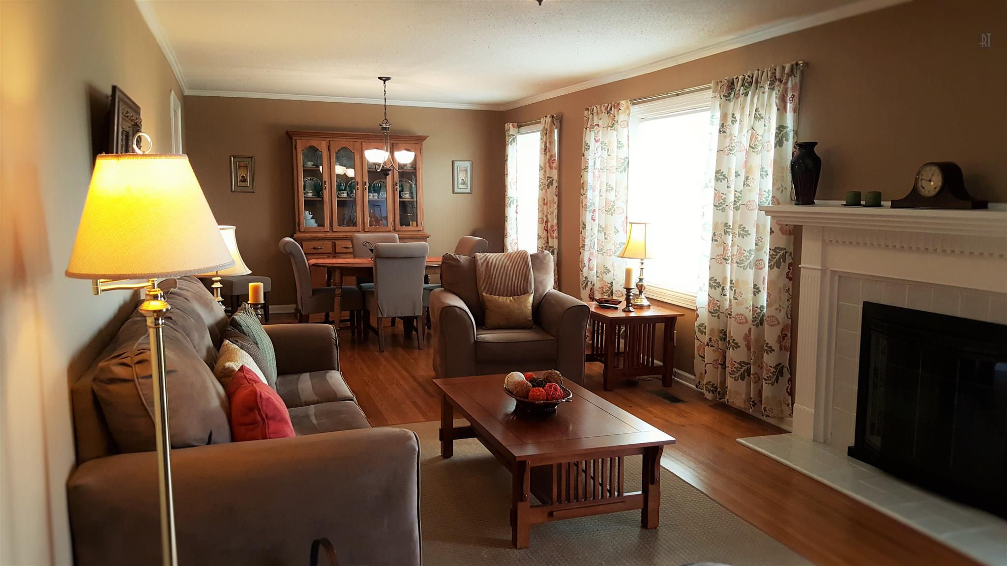 4813 Midland Road Christiana, TN 37037 - Photo 11 of 18 Living room/Dining room combo with ample natural light, orig. hardwood, and working wood burning fireplace. Great place to welcome family and friends. All new energy efficient windows in the home.