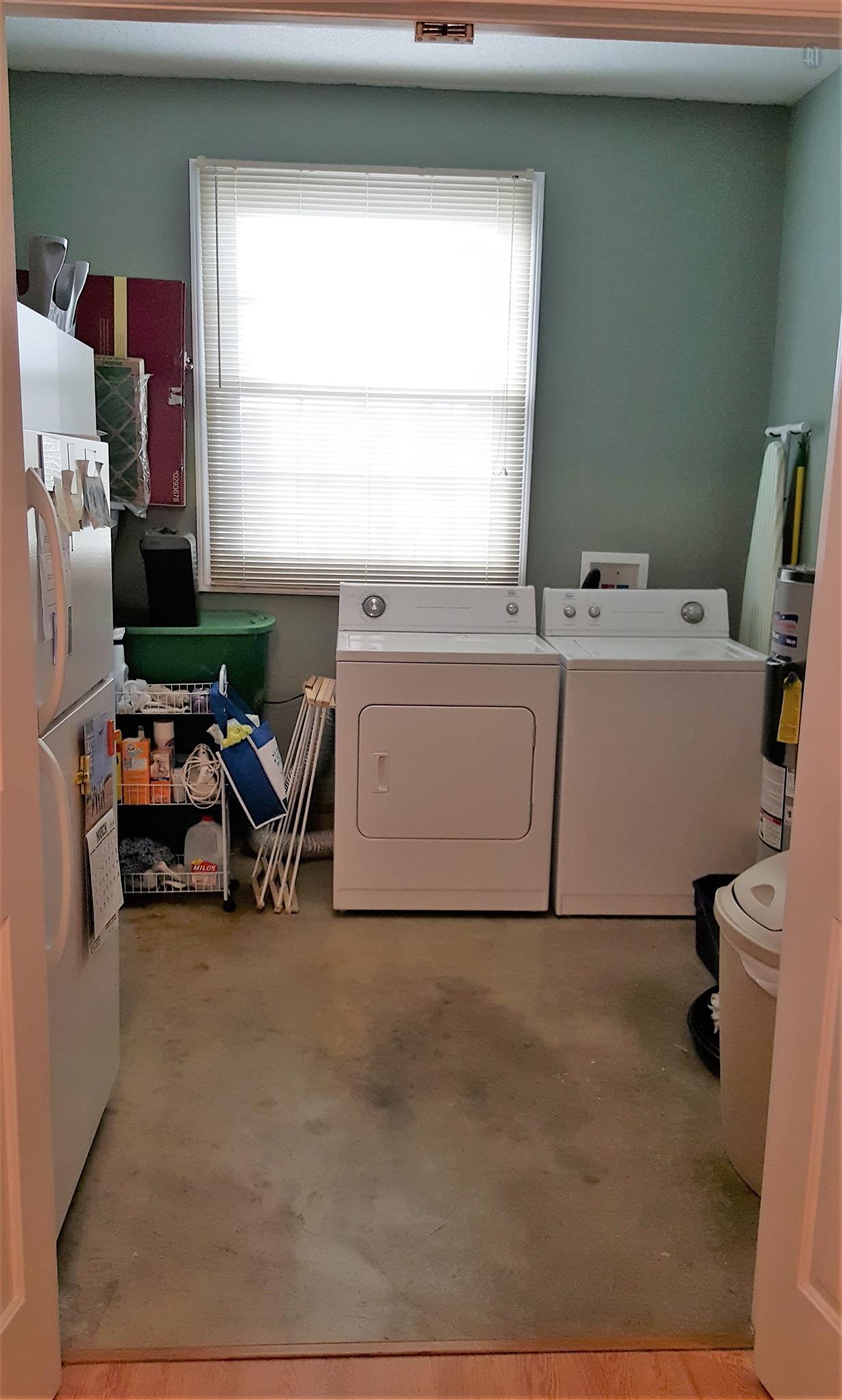 4813 Midland Road Christiana, TN 37037 - Photo 18 of 18 Laundry room with extra space to add your own additional fridge and shelving. Fridge, shelving and w/d do not convey with home.