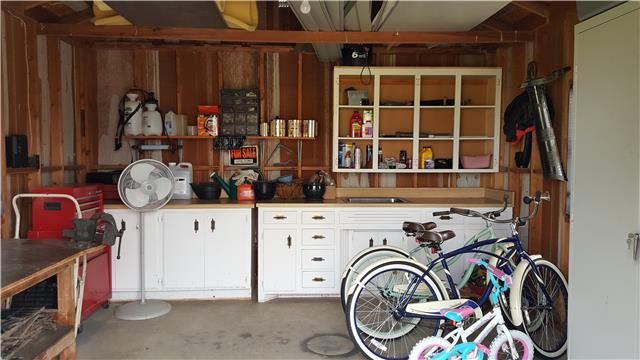 Storage shed #1 Has cabinets, shelves and drawers fro tools.