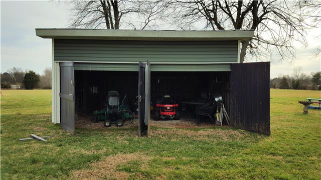 Storage shed #2, store riding mower or convert to barn for animals.