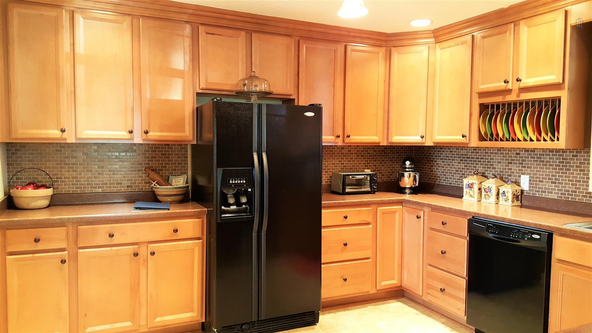 4813 Midland Road Christiana, TN 37037 - Photo 9 of 18 Plenty of Cabinets and counter space, look at that adorable plate rack.