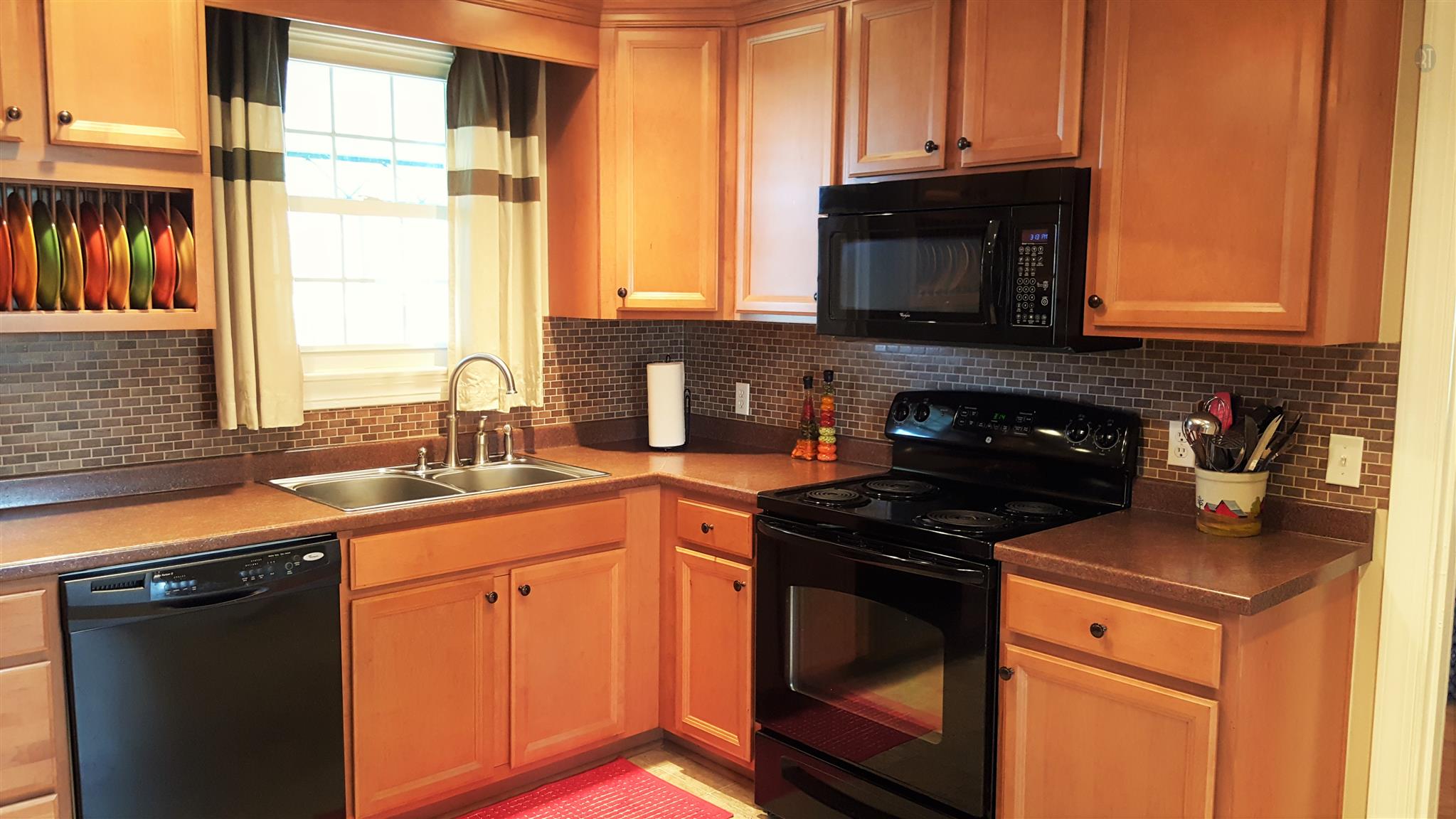 4813 Midland Road Christiana, TN 37037 - Photo 10 of 18 All appliances in kitchen remain. Beautiful tile back splash and bead board ceiling, pendent and can lights accent this VERY clean kitchen.