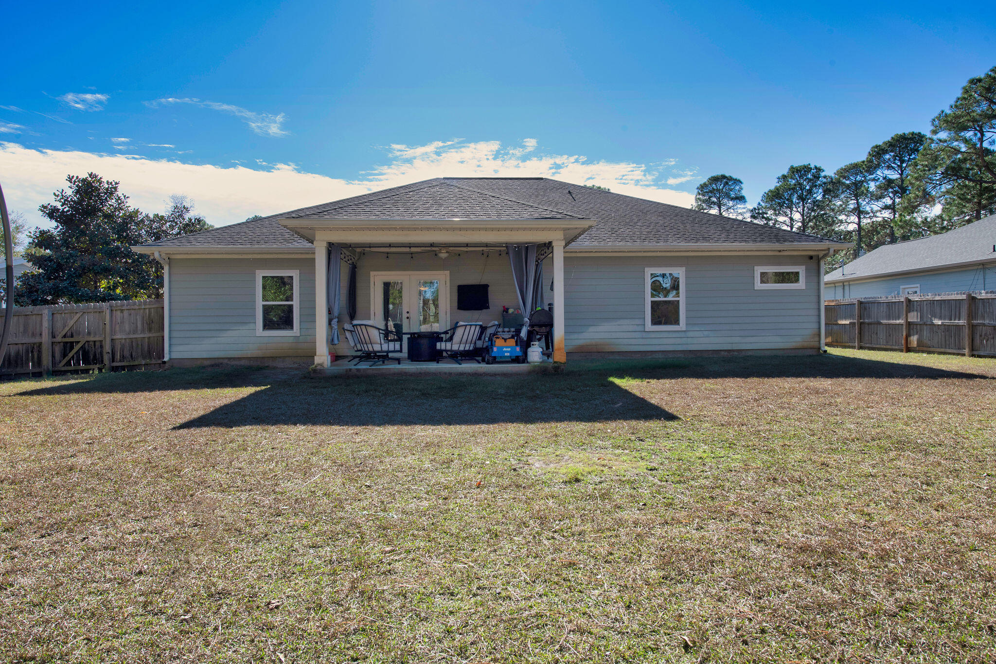 8914 Timber Lane Navarre, FL 32566 - Photo 37 of 40 a view of a house with a patio
