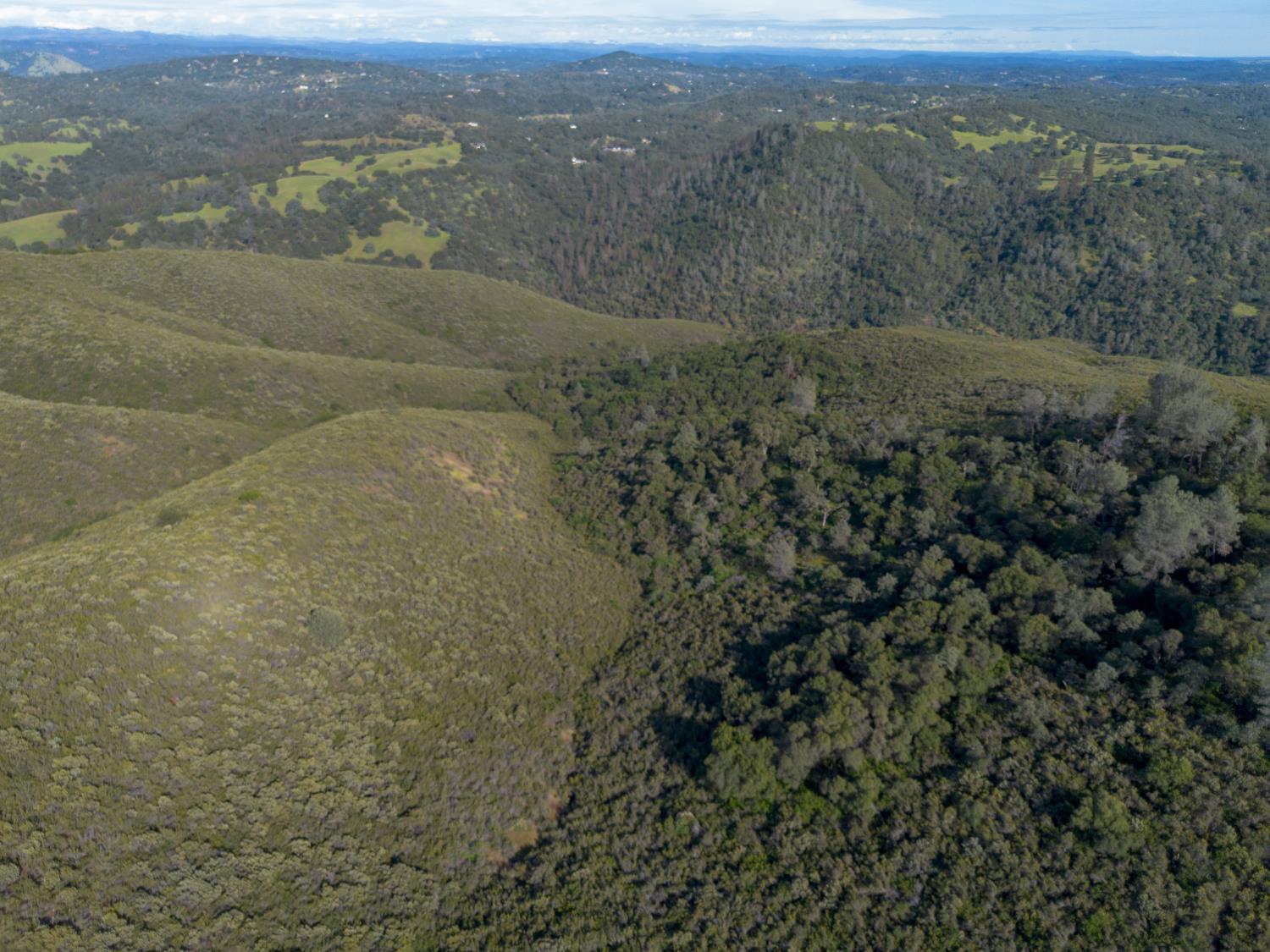 0 Storksbill Road Pilot Hill, CA 95664 - Photo 7 of 15 an aerial view of residential houses with outdoor space and trees