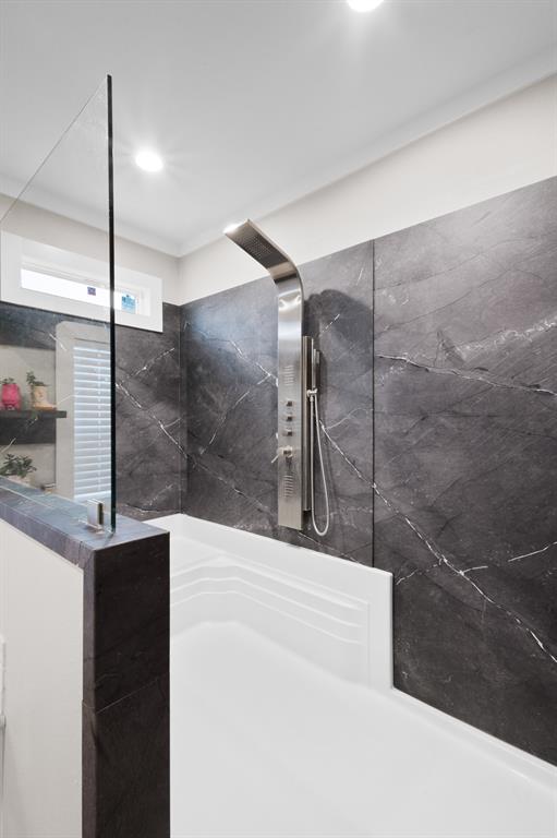 1012 County Road 1180 Decatur, TX 76234 - Photo 17 of 34 a bathroom with a shower and a sink