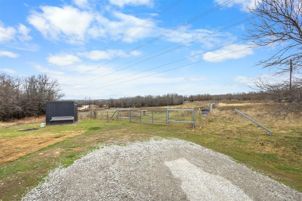 1012 County Road 1180 Decatur, TX 76234 - Photo 33 of 34 a view of a lake with a yard