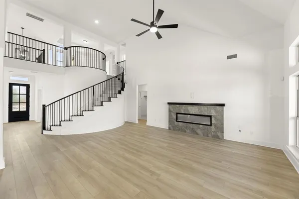 a view of staircase and kitchen with sink
