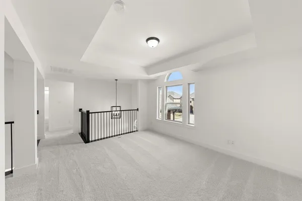 a view of a room with windows
