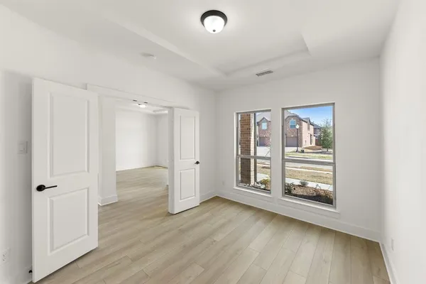 a view of livingroom with hardwood floor and window