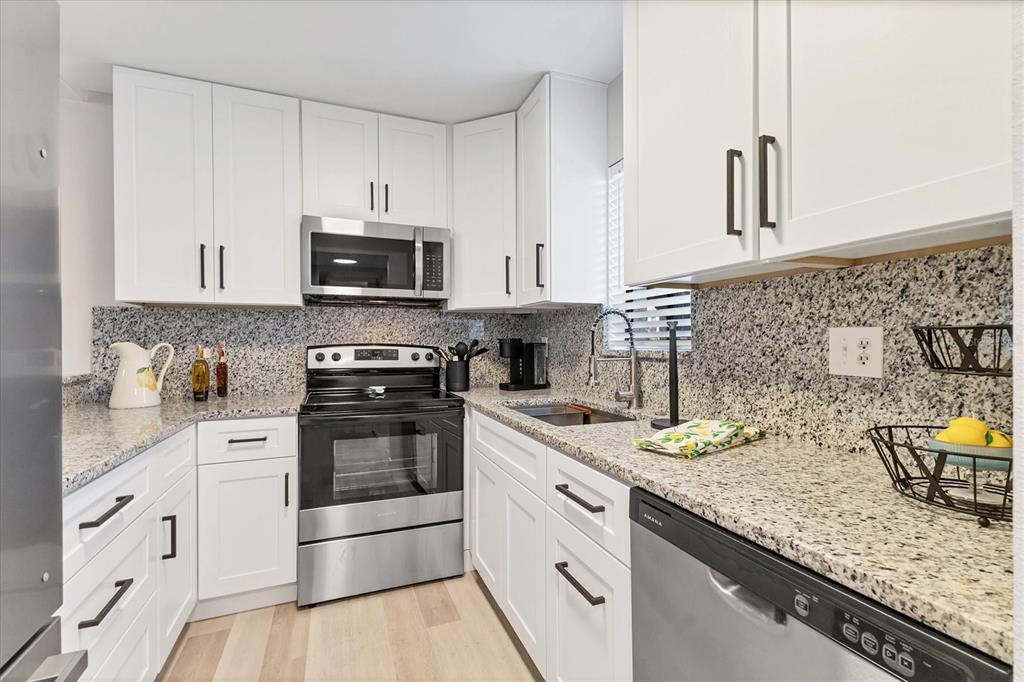 1644 Stickney Point Road, Unit 102 Sarasota, FL 34231 - Photo 11 of 37