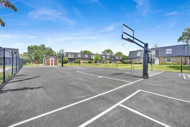 a view of a hallway with stairs
