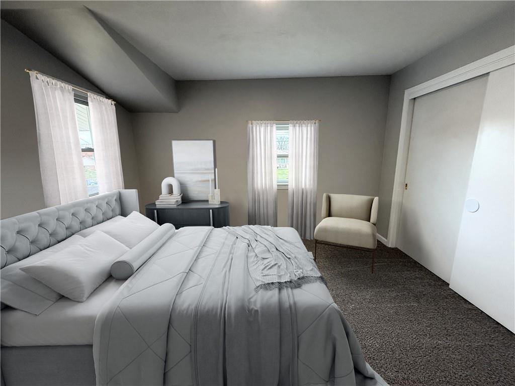 2026 Marshall Road Monaca, PA 15061 - Photo 14 of 30 a bedroom with a bed couch and window