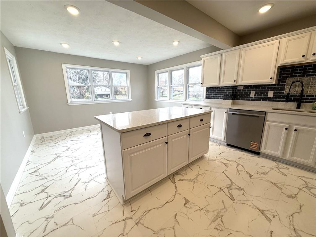 2026 Marshall Road Monaca, PA 15061 - Photo 24 of 30 a large white kitchen with cabinets