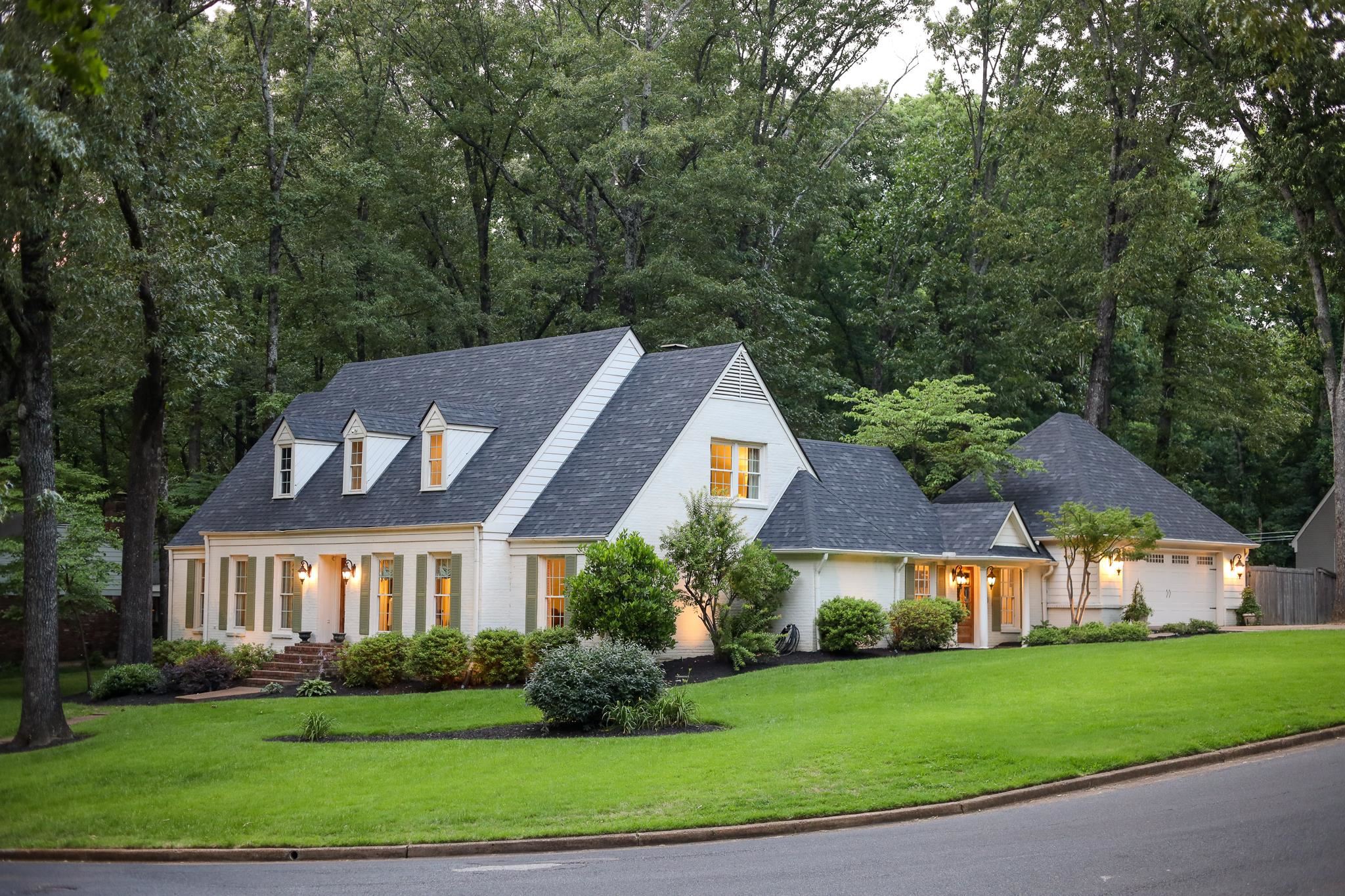 6164 Harwick Drive Memphis, TN 38119 - Photo 1 of 29 a front view of a house with a yard