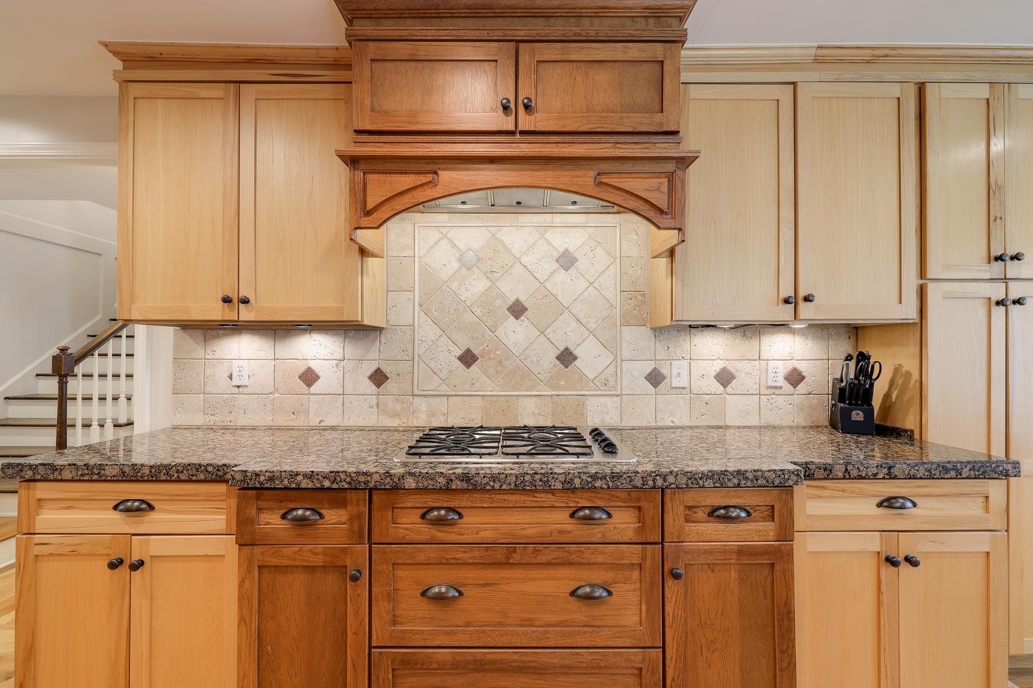 6164 Harwick Drive Memphis, TN 38119 - Photo 15 of 29 a kitchen with granite countertop white cabinets and white appliances