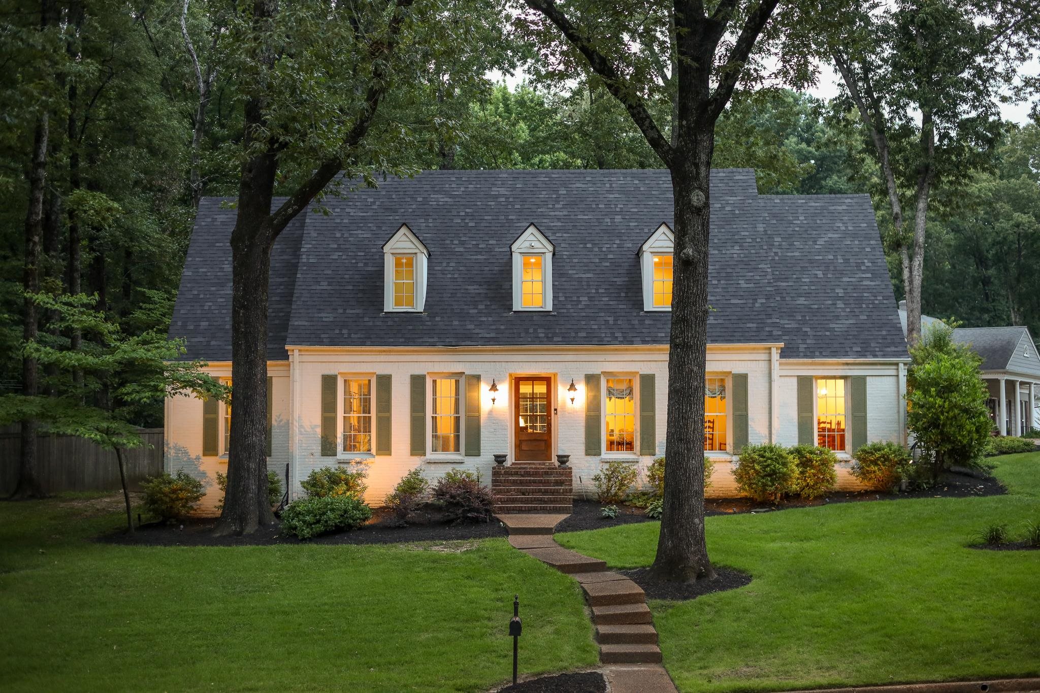 6164 Harwick Drive Memphis, TN 38119 - Photo 2 of 29 a front view of a house with garden