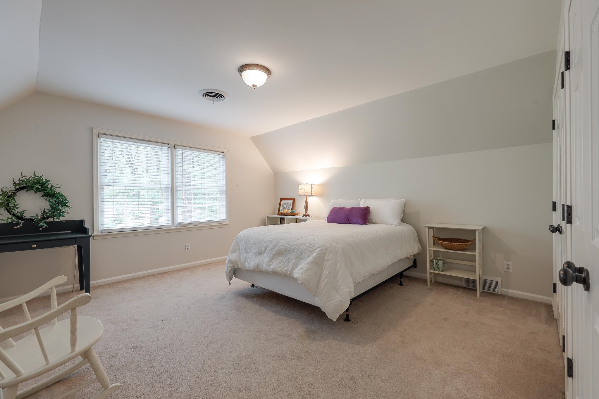 6164 Harwick Drive Memphis, TN 38119 - Photo 25 of 29 a bedroom with a bed and a window