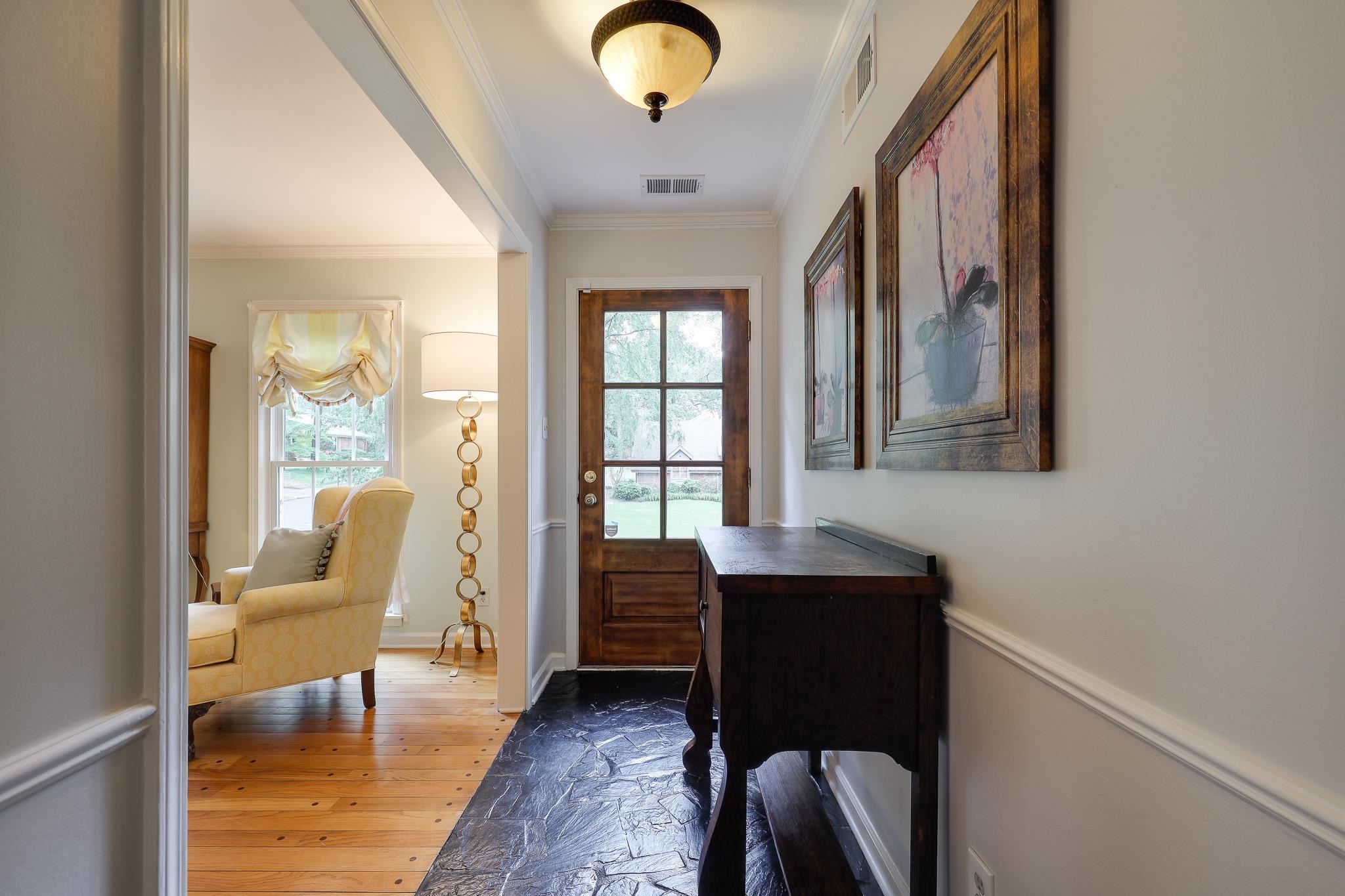 6164 Harwick Drive Memphis, TN 38119 - Photo 4 of 29 a view of a workspace with furniture and a window