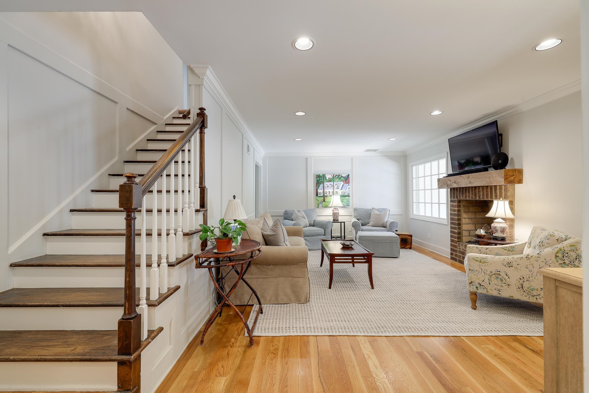 6164 Harwick Drive Memphis, TN 38119 - Photo 9 of 29 a living room with furniture and a fireplace