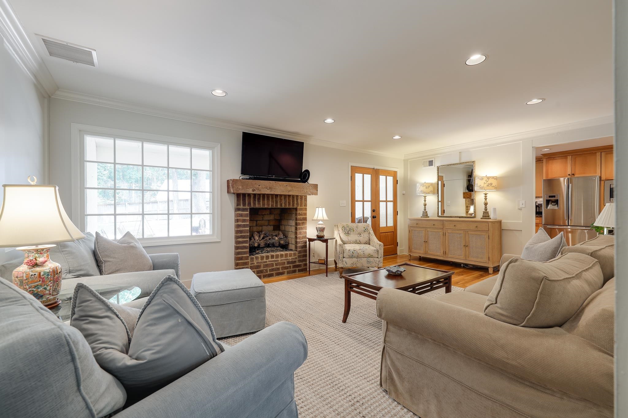 6164 Harwick Drive Memphis, TN 38119 - Photo 10 of 29 a living room with furniture or fireplace and a flat screen tv
