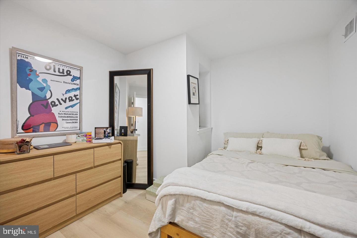 1228 South 2nd Street Philadelphia, PA 19147 - Photo 21 of 35 a bedroom with a bed and a desk
