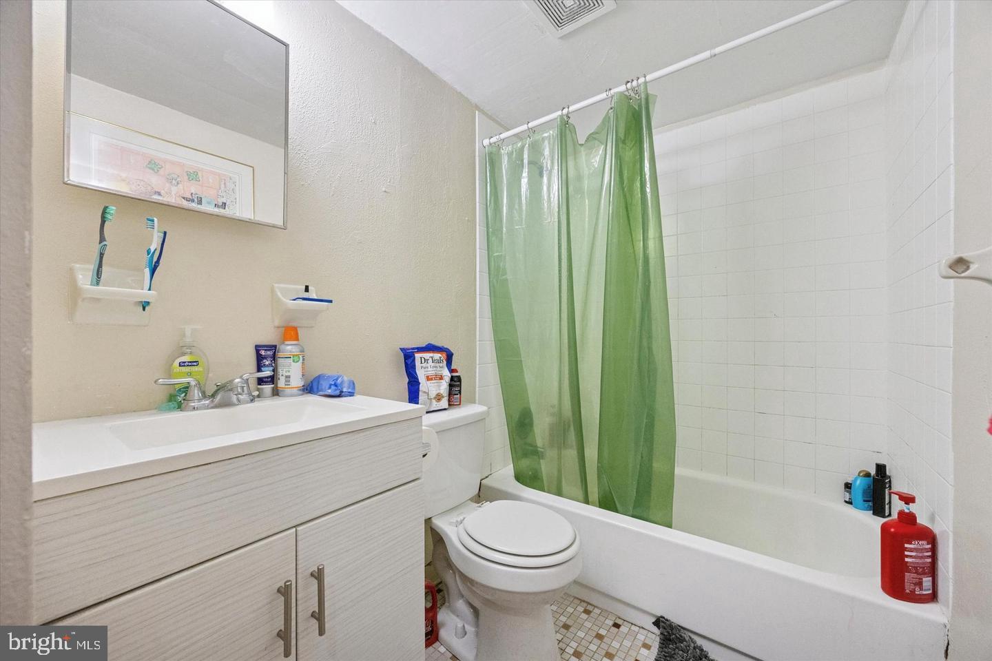 1228 South 2nd Street Philadelphia, PA 19147 - Photo 34 of 35 a bathroom with a sink a toilet and a shower