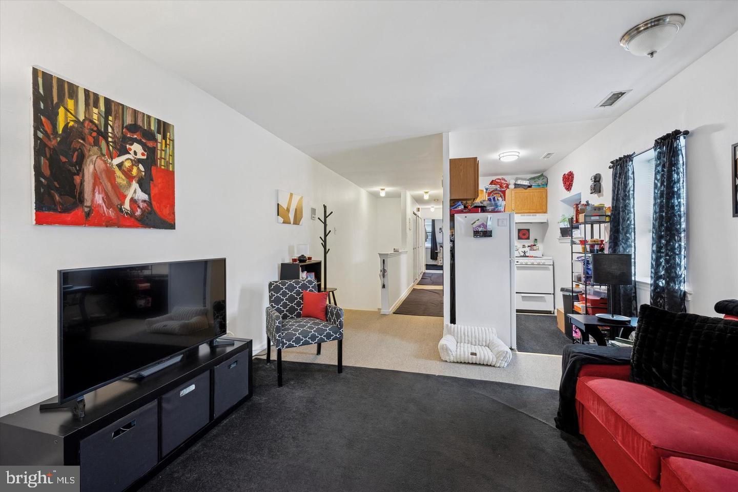 1228 South 2nd Street Philadelphia, PA 19147 - Photo 5 of 35 a living room with furniture and a flat screen tv