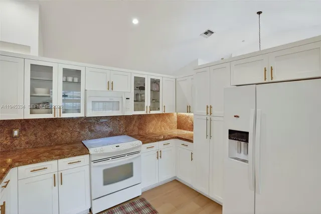 a workspace with furniture and window