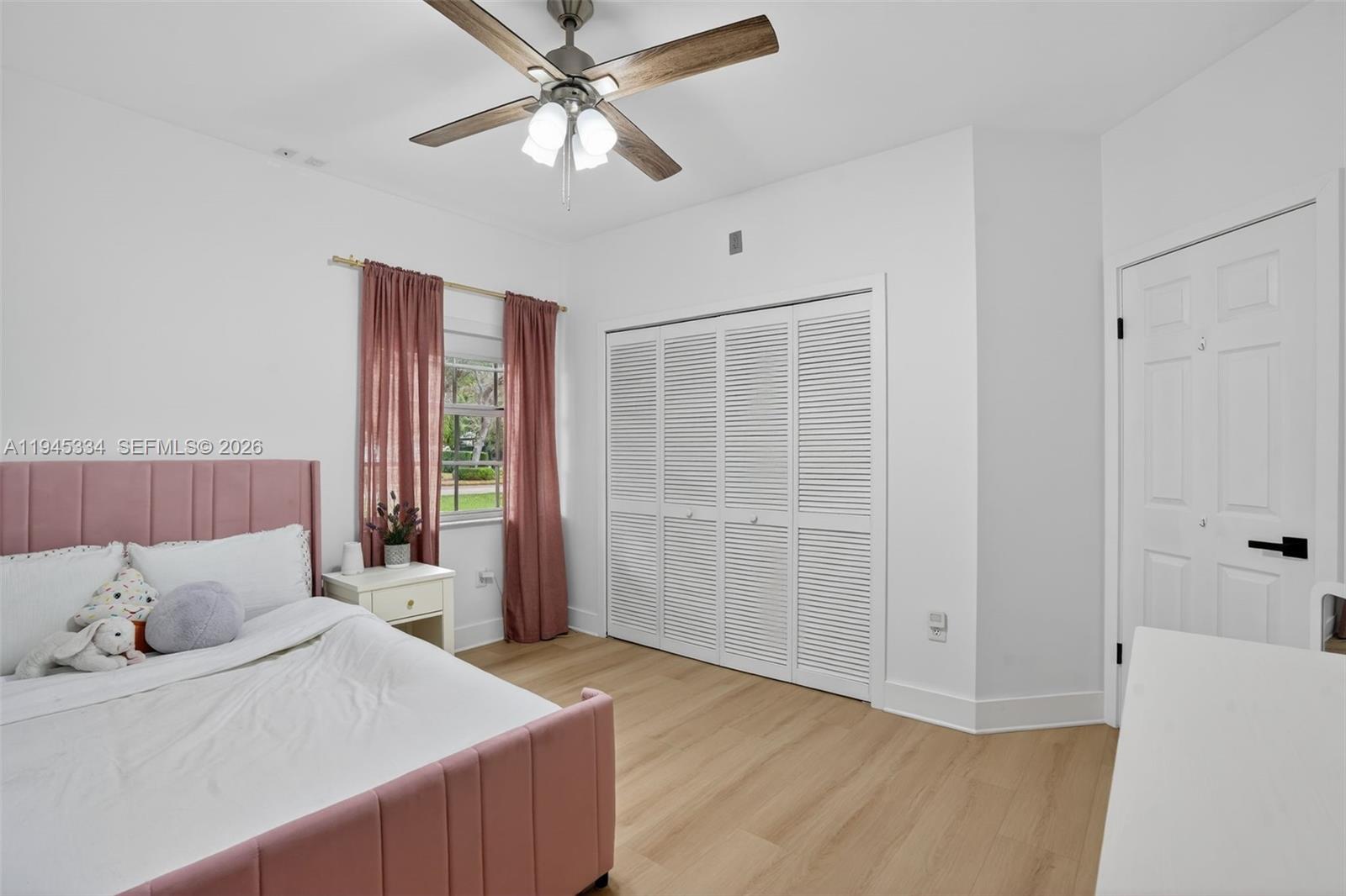 12200 Southwest 100th Street Miami, FL 33186 - Photo 26 of 48 a living room with furniture and a window