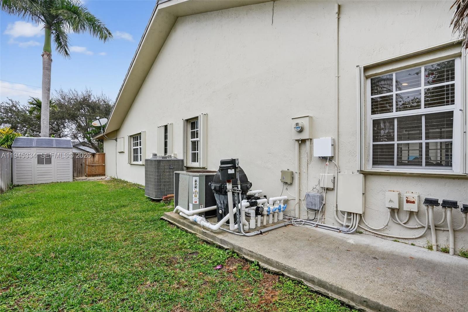 12200 Southwest 100th Street Miami, FL 33186 - Photo 38 of 48 a view of a porch with furniture and garden