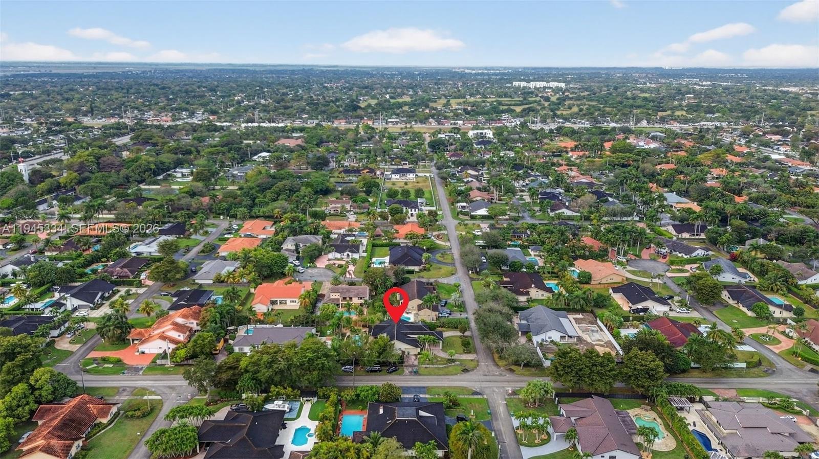12200 Southwest 100th Street Miami, FL 33186 - Photo 46 of 48 an aerial view of city and lake